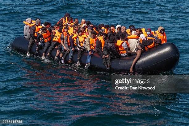 An inflatable 'small boat' carrying migrants crosses the channel after leaving northern France on April 27, 2026 in Dover, England. Last week the UK...