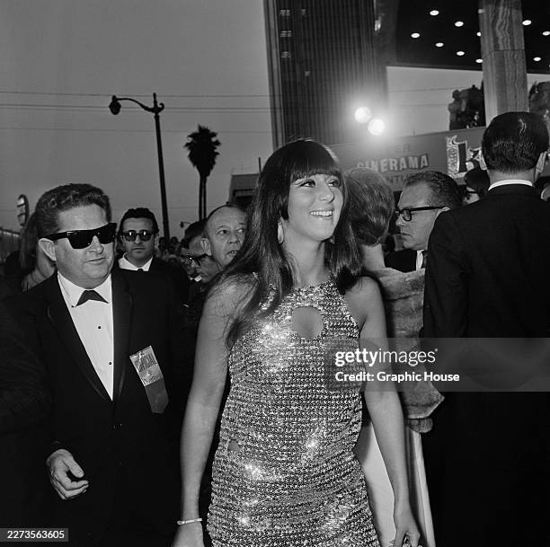 American singer and actress Cher attends the Hollywood premiere of 'Khartoum' at the Cinerama Dome in the Hollywood neighbourhood of Los Angeles,...