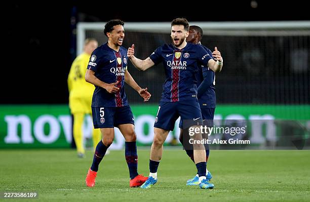 Khvicha Kvaratskhelia of Paris Saint-Germain celebrates scoring his team's first goal with Marquinhos during the UEFA Champions League 2025/26 Semi...