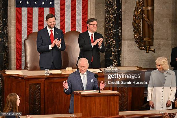 Vice President JD Vance and Speaker of the House Mike Johnson applaud following King Charles III's address to a joint meeting of Congress at the U.S....