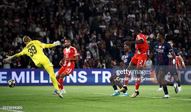 Dayot Upamecano of FC Bayern Munich scores his team's third goal past Matvey Safonov of Paris Saint-Germain during the UEFA Champions League 2025/26...
