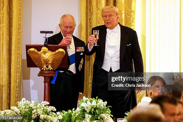 King Charles III and U.S. President Donald Trump give a toast in the East Room during an official state dinner at The White House on day two of the...