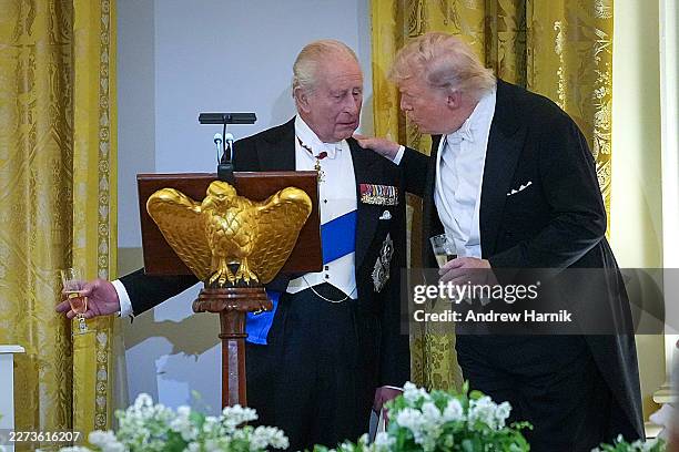 King Charles III speaks with U.S. President Donald Trump during a state dinner in the East Room of the White House on April 28, 2026 in Washington,...