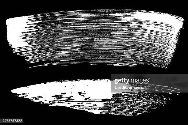 white sweeping brush strokes on black background - white sweep stock illustrations