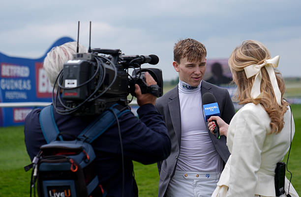 Jockey Billy Loughnane is interviewed on the course ahead of the Betfred 1000 Guineas Day of the Guineas Festival at Newmarket Racecourse, Suffolk....