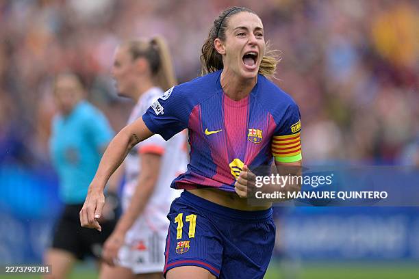 Barcelona's Spanish midfielder Alexia Putellas celebrates scoring her team's second goal during the UEFA Women's Champions League semi-final second...