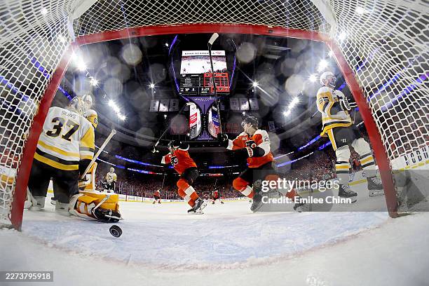 The Philadelphia Flyers celebrate the game-winning goal by Cam York against the Pittsburgh Penguins during overtime in Game Six of the First Round of...