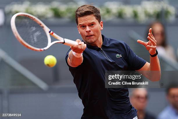 Alexander Blockx of Belgium hits a forehand to Casper Ruud of Norway during their Madrid Open quarter-final match at the at La Caja Magica on April...