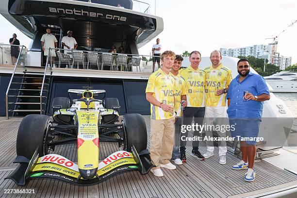 Liam Lawson, Arvid Linblad, Alan Permane, Peter Bayer and DJ Khaled attend Visa Cash App Racing Bulls Reveals Red Bull Summer Edition Livery For...