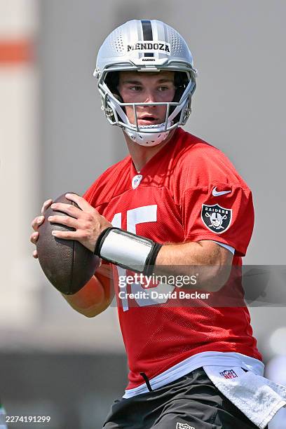 Fernando Mendoza of the Las Vegas Raiders handles the ball during the team's rookie minicamp at the Las Vegas Raiders Headquarters/Intermountain...