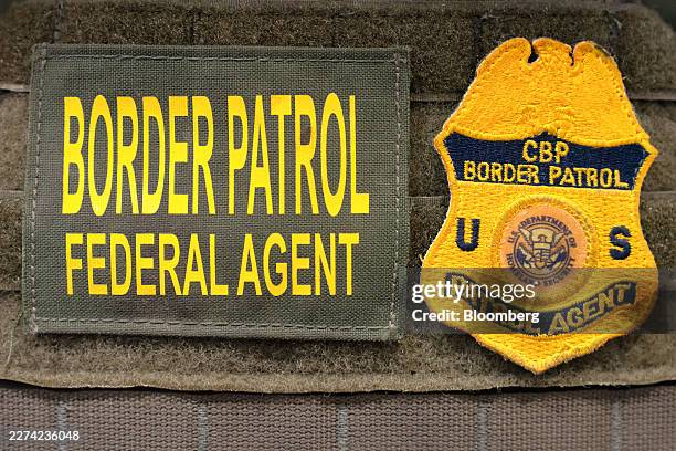 Border Patrol patches are affixed to a bulletproof vest at the Border Security Expo in Phoenix, Arizona, US, on Tuesday, May 5, 2026. White House...