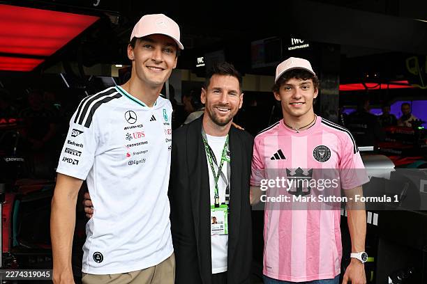 Lionel Messi with George Russell of Great Britain and Mercedes AMG Petronas F1 Team and Andrea Kimi Antonelli of Italy and Mercedes AMG Petronas F1...