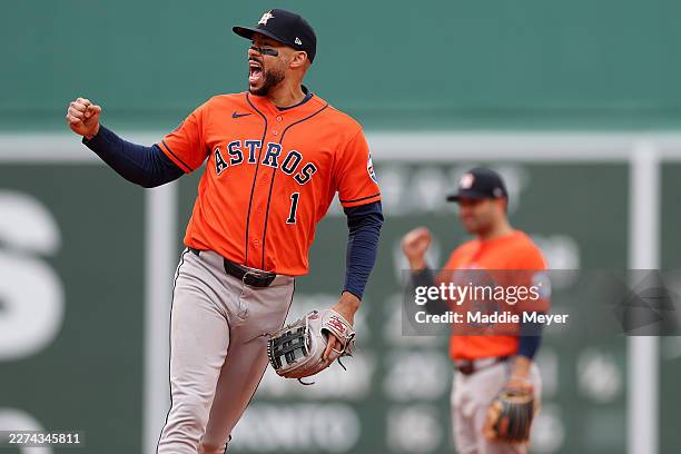 Carlos Correa of the Houston Astros celebrates after turning a double play to end the tenth inning at Fenway Park on May 03, 2026 in Boston,...