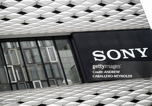 Sony logo is seen on the side of a building next to a lounge in Tokyo on May 8, 2026. Japanese electronics giant Sony on May 8 forecast a 13 percent...