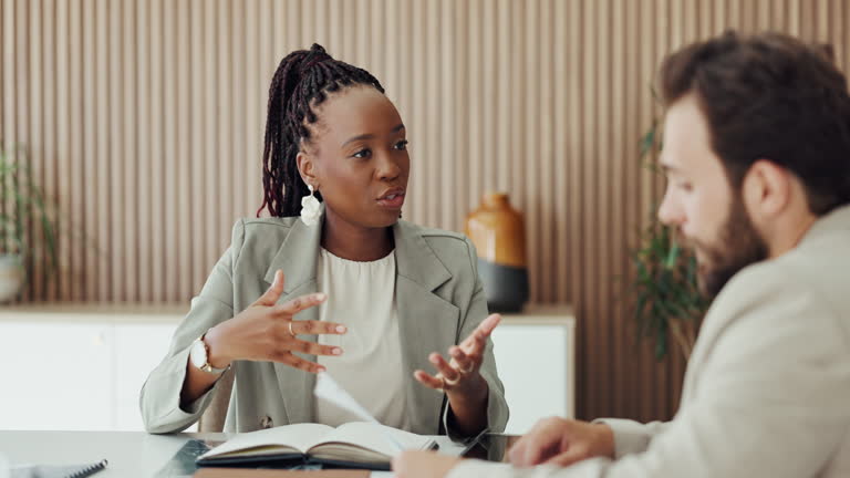 https://media.gettyimages.com/id/2274496333/video/discussion-paperwork-and-business-people-in-office-for-finance-planning-with-budget.jpg?b=1&s=640x640&k=20&c=7pq3uhCchBgz_C5RV8KaF0YWddeP9BI8tLVV4lQM-FA=