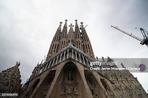 Cross stands atop the Tower of Jesus Christ, surrounded by the Apostles’ towers at the Sagrada Familia on May 4, 2026 in Barcelona, Spain. Pope Leo...