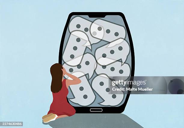 overwhelmed girl kneeling with head in hands next to text message speech bubbles on device screen - large screen stock illustrations