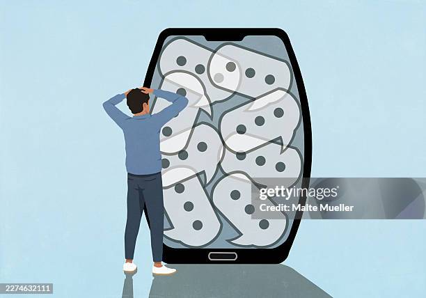 overwhelmed man with head in hands looking at text message speech bubbles on smart watch screen - large screen stock illustrations