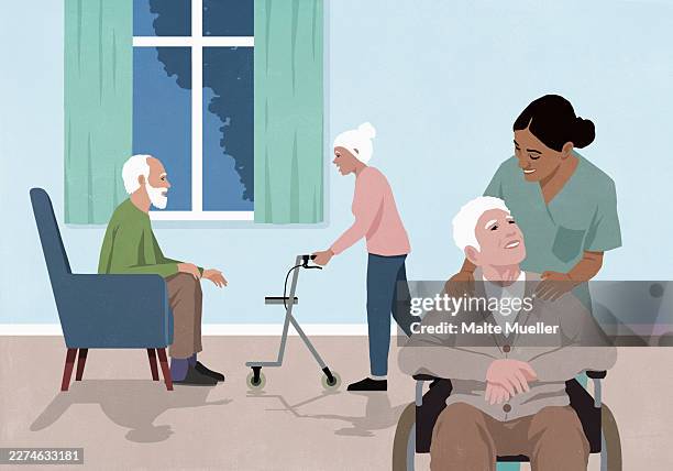 friendly female nurse with senior man in wheelchair in assisted care facility - retirement community stock illustrations