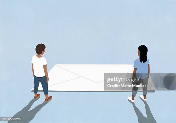 man and woman looking down at large white envelope against blue background - couple looking at bill stock illustrations