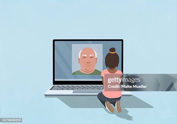 young girl video chatting with old man on laptop screen - stranger stock illustrations