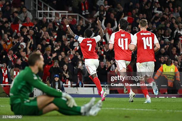Bukayo Saka of Arsenal celebrates scoring his team's first goal during the UEFA Champions League 2025/26 Semi Final Second Leg match between Arsenal...