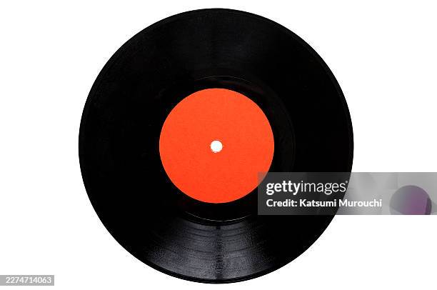 single vinyl record with a clipping path on a white background - schallplatte stock-fotos und bilder