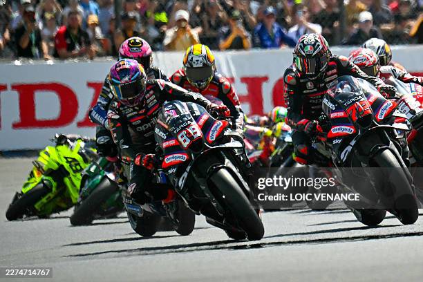Aprilia Racing's Spanish rider Jorge Martin leads Aprilia Racing's Italian rider Marco Bezzecchi during the Moto GP Grand Prix of France Sprint race...