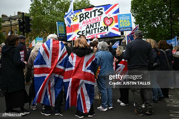 People attend a rally organised by the Campaign Against Antisemitism, opposite Downing Street in central London on May 10, 2026.