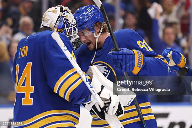 Alex Lyon and Josh Doan of the Buffalo Sabres celebrate their team's victory against the Montréal Canadiens in Game One of the Second Round of the...