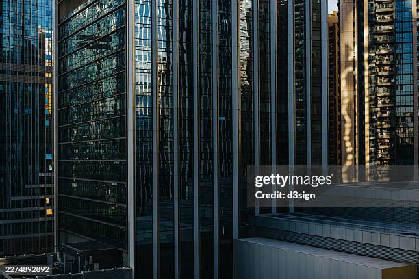 modern financial and corporate skyscrapers facades with urban architectural designs in central business district, shenzhen. concept of business, finance and economy - monopoly hotel stock pictures, royalty-free photos & images