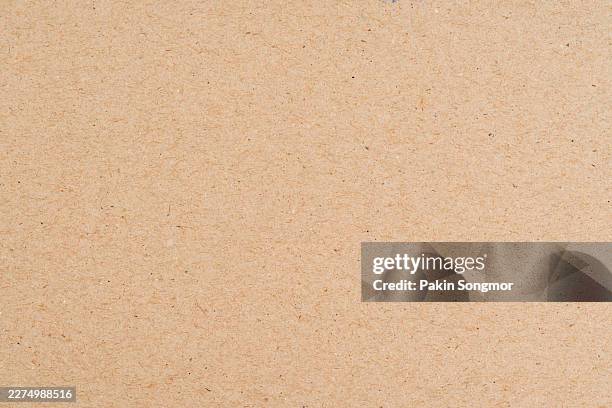 brown paper sheet texture cardboard background. - brown suit stock pictures, royalty-free photos & images