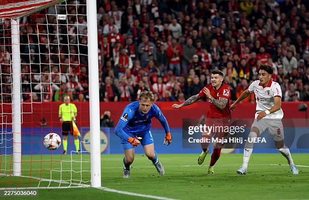 Lukas Kuebler of Sport-Club Freiburg scores his team's first goal during the UEFA Europa League 2025/26 Semi-Final Second Leg match between...