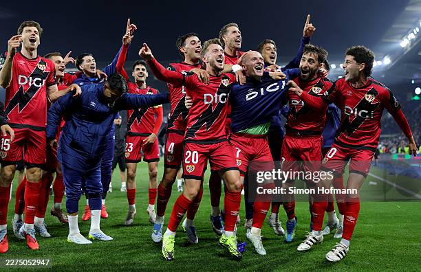 Ivan Balliu and Isi Palazon of Rayo Vallecano celebrate with teammates following the team's victory during the UEFA Europa Conference League match...