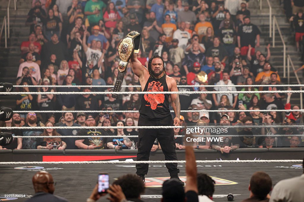 Jacob Monday Jacob Fatu holds up the World Heavyweight Champion during RAW at ...