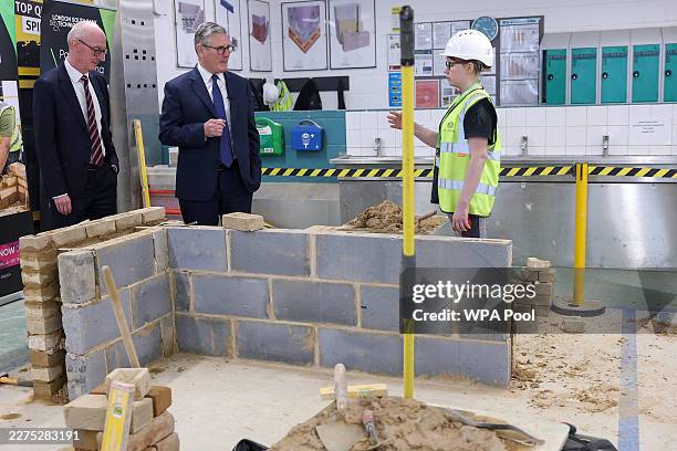 Prime Minister Keir Starmer and Secretary of State for the Department for Work and Pensions, Pat McFadden, meet construction apprentices during a...