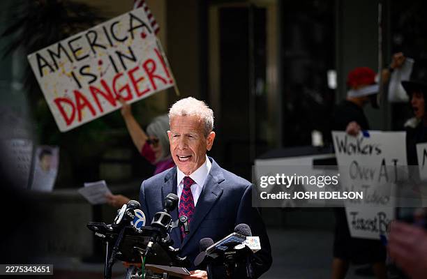 Attorney Marc Toberoff, representing Elon Musk, speaks during a press conference outside the federal courthouse during proceedings in the trial over...