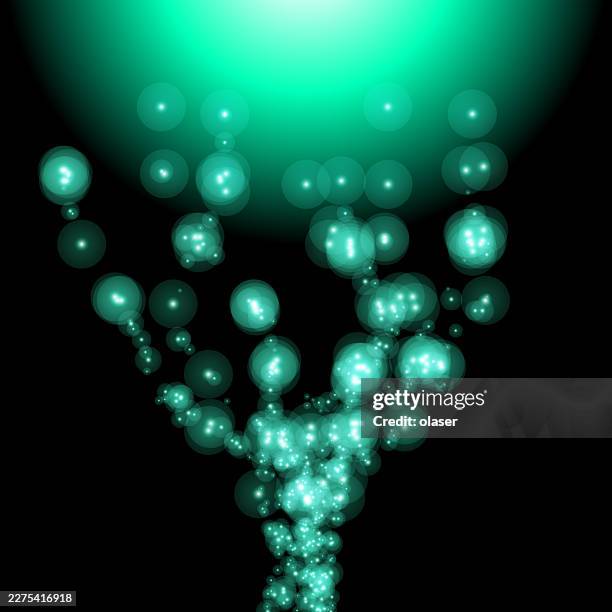 glowing turquoise light orbs rise against a black background, forming a sparkling vertical trail beneath a bright green gradient at the top. - green light stock illustrations