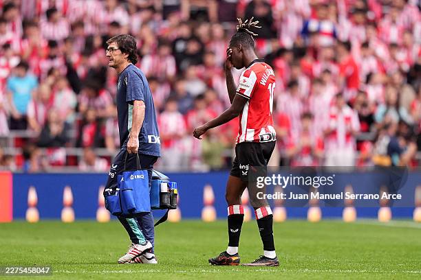 Nico Williams of Athletic Club reacts as he leaves the pitch after picking up an injury during the LaLiga EA Sports match between Athletic Club and...
