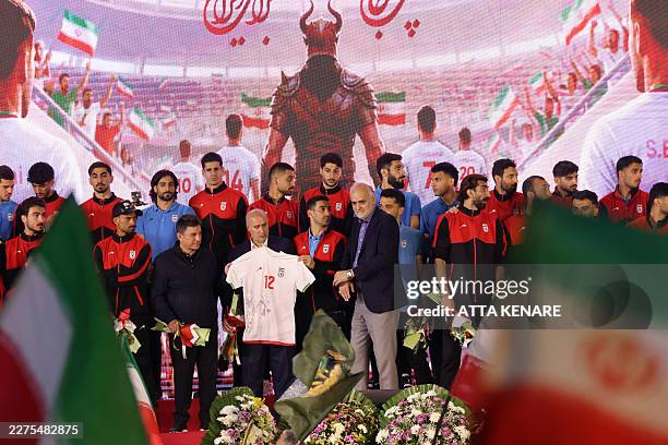 Members of Iran's national football team attend a farewell ceremony ahead of their departure for the 2026 FIFA World Cup, in Tehran on May 13, 2026....
