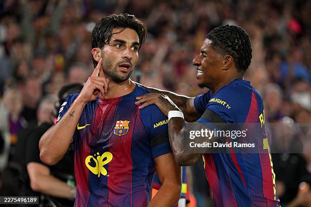 Ferran Torres of FC Barcelona celebrates scoring his team's second goal with teammate Marcus Rashford during the LaLiga EA Sports match between FC...
