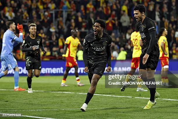 Paris Saint-Germain's French forward Ibrahim Mbaye celebrates after scoring a goal during the French L1 football match between RC Lens and Paris...