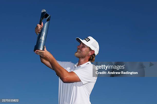 Kristoffer Reitan of Norway poses with the trophy after winning the Truist Championship 2026 at Quail Hollow Country Club on May 10, 2026 in...