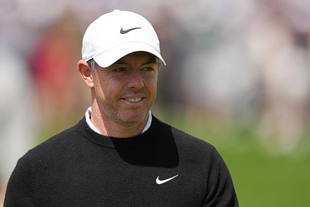 Rory McIlroy of Northern Ireland walks on the 18th green during the first round of PGA Championship at Aronimink Golf Club on May 14, 2026 in Newtown...