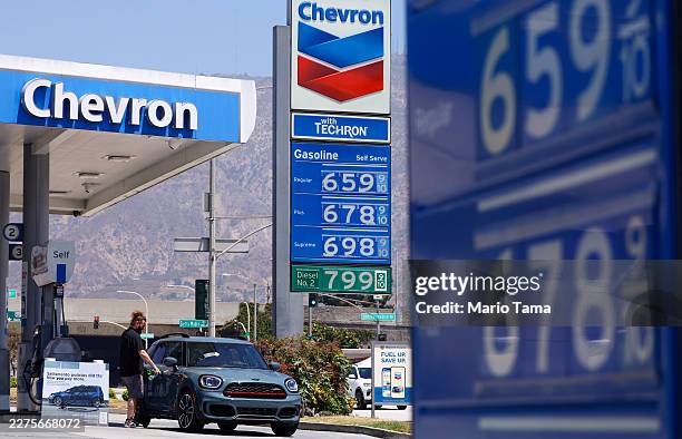 High gas prices are displayed at a Chevron gas station on May 11, 2026 in Pasadena, California. President Trump today said he wants to suspend the...