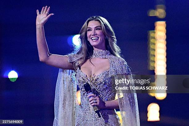 Australian singer Delta Goodrem, representing Australia with the song 'Eclipse', reacts after her performance during the second semi-final of the...
