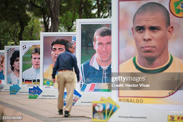 Man walks past an exhibition of Panini FIFA World Cup stickers at Paseo de la Reforma on May 11, 2026 in Mexico City, Mexico. Mexico City will host...