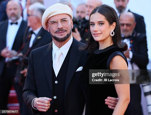 John Travolta and Ella Bleu Travolta attend the "Karma" screening during the 79th annual Cannes Film Festival at Palais des Festivals on May 15, 2026...