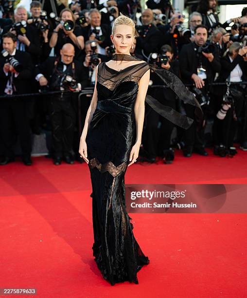 Poppy Delevingne attends the opening ceremony and "La Vénus Electrique" screening during the 79th annual Cannes Film Festival at Palais des Festivals...