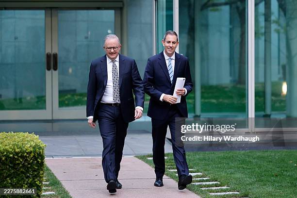 Australian Prime Minister Anthony Albanese and Treasurer Jim Chalmers arrive at Parliament House on May 13, 2026 in Canberra, Australia. The Labor...